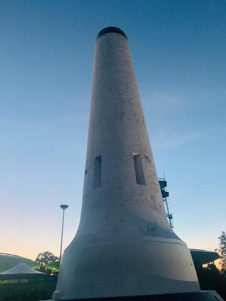 The imposing structure of the Mount Lofty Summit standing tall against a twilight sky, a landmark destination for those exploring the Adelaide Hills and seeking panoramic views.